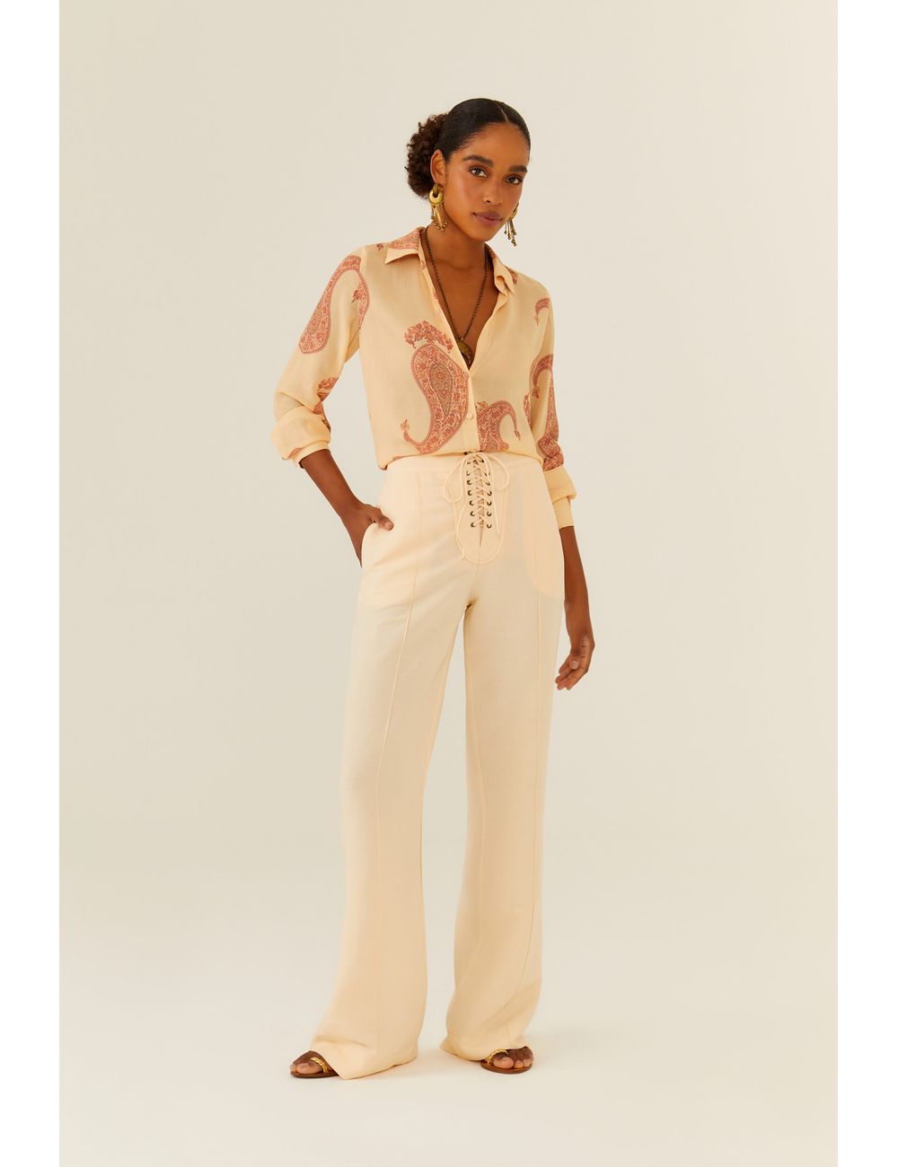 Calça Ilhós Rolotê